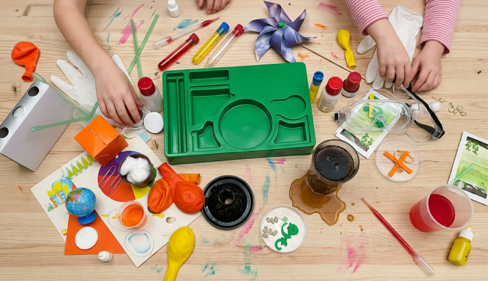 Kids using a Science4you kit at the kitchen table